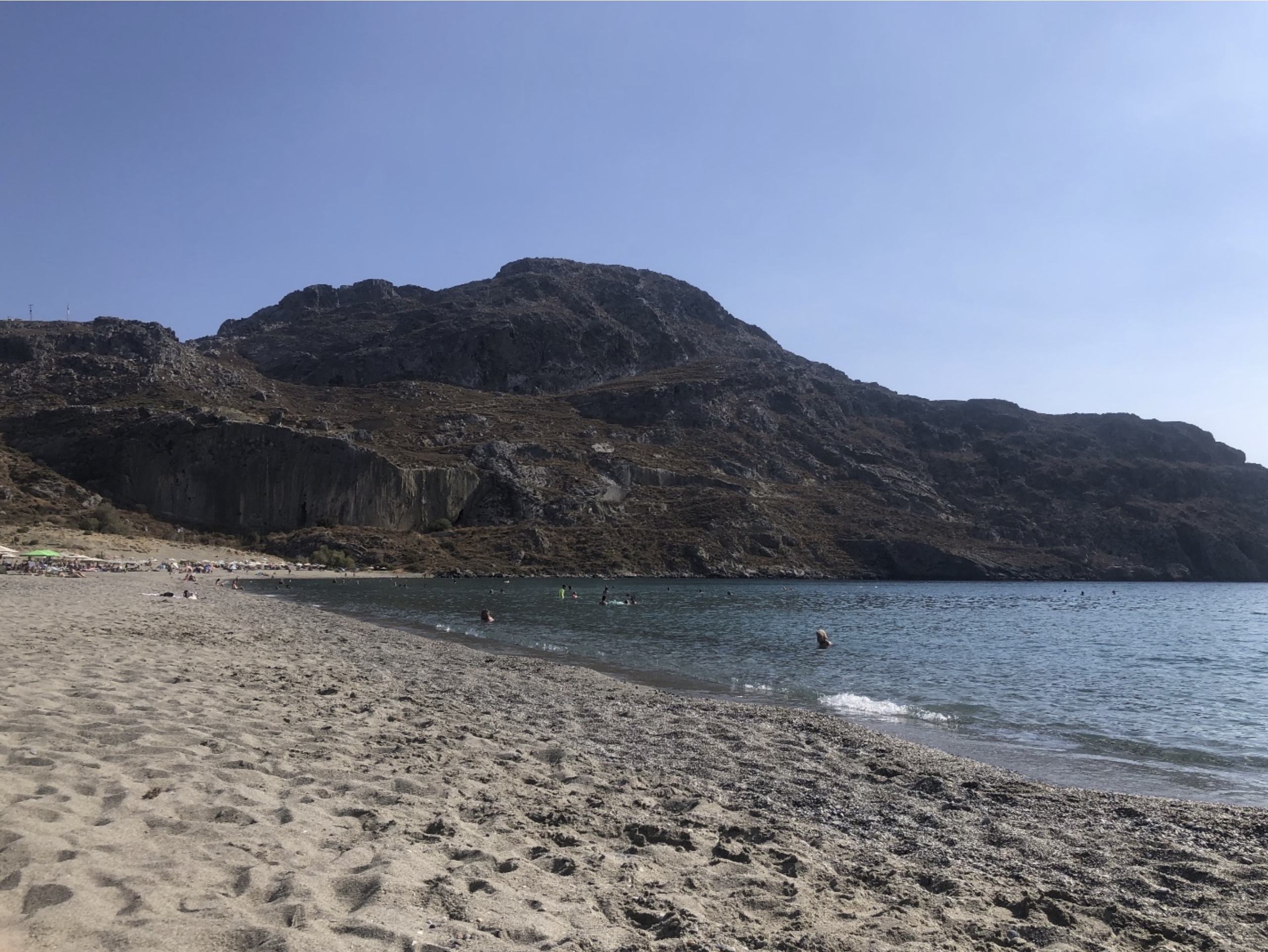 The beach of Plakias and the cliff of Paligremnos on the background, a protected monument of nature